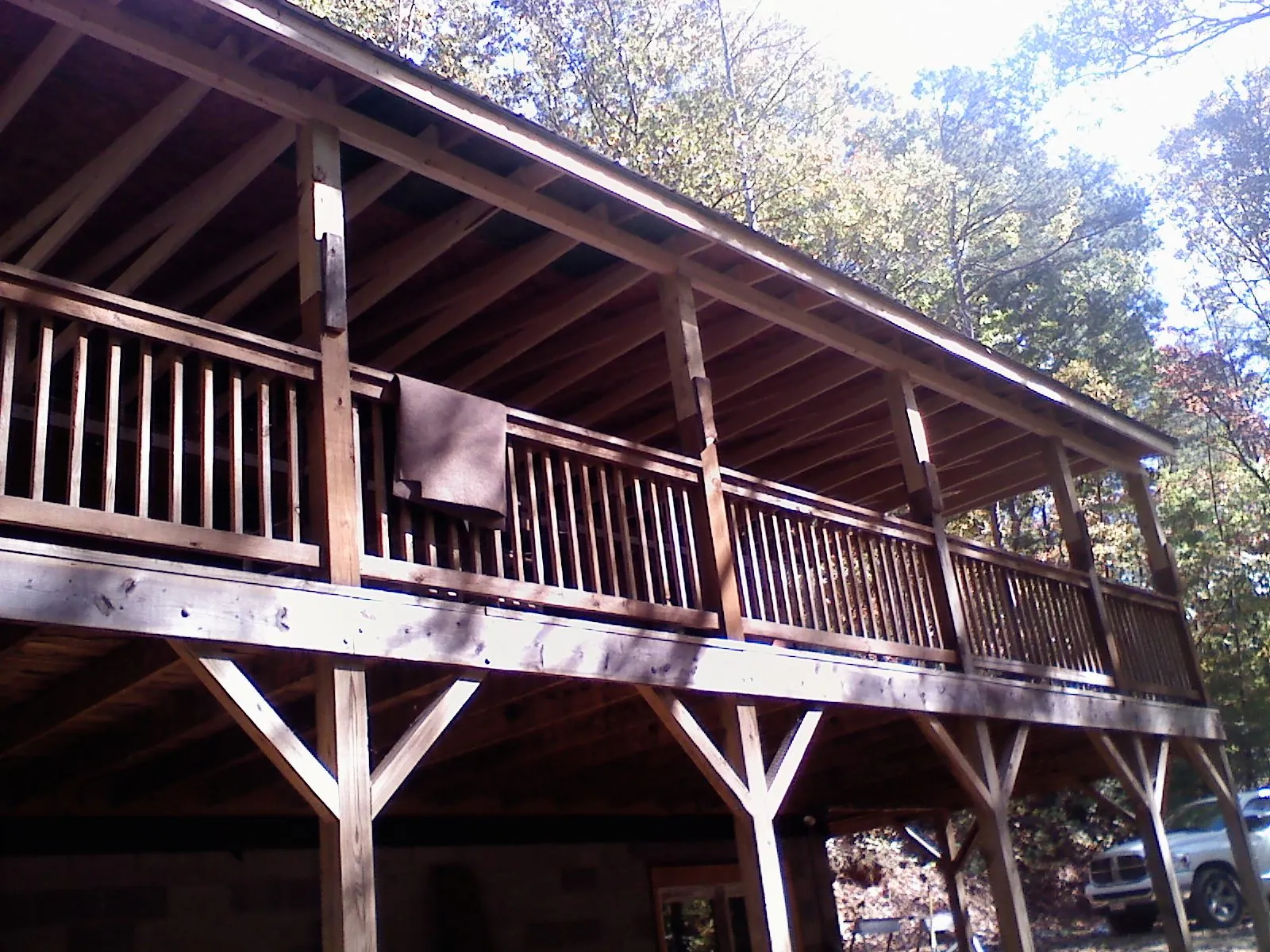 Timber framing under a new elevated porch and deck — Roof Leak Repair in Four Lakes by Roofing Brothers